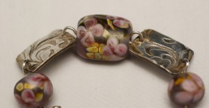 Focal bead of floral bracelet